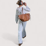 Mila™ | Laukku sivurypytyksellä